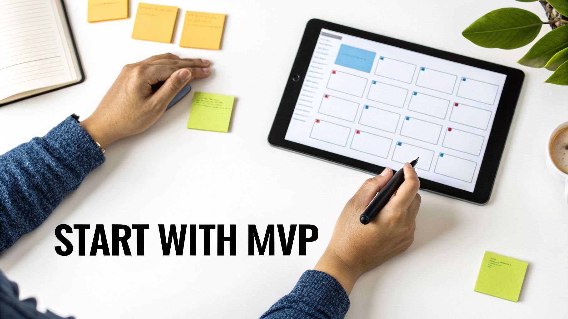 Hands using a stylus on a tablet for project planning, with sticky notes and coffee.