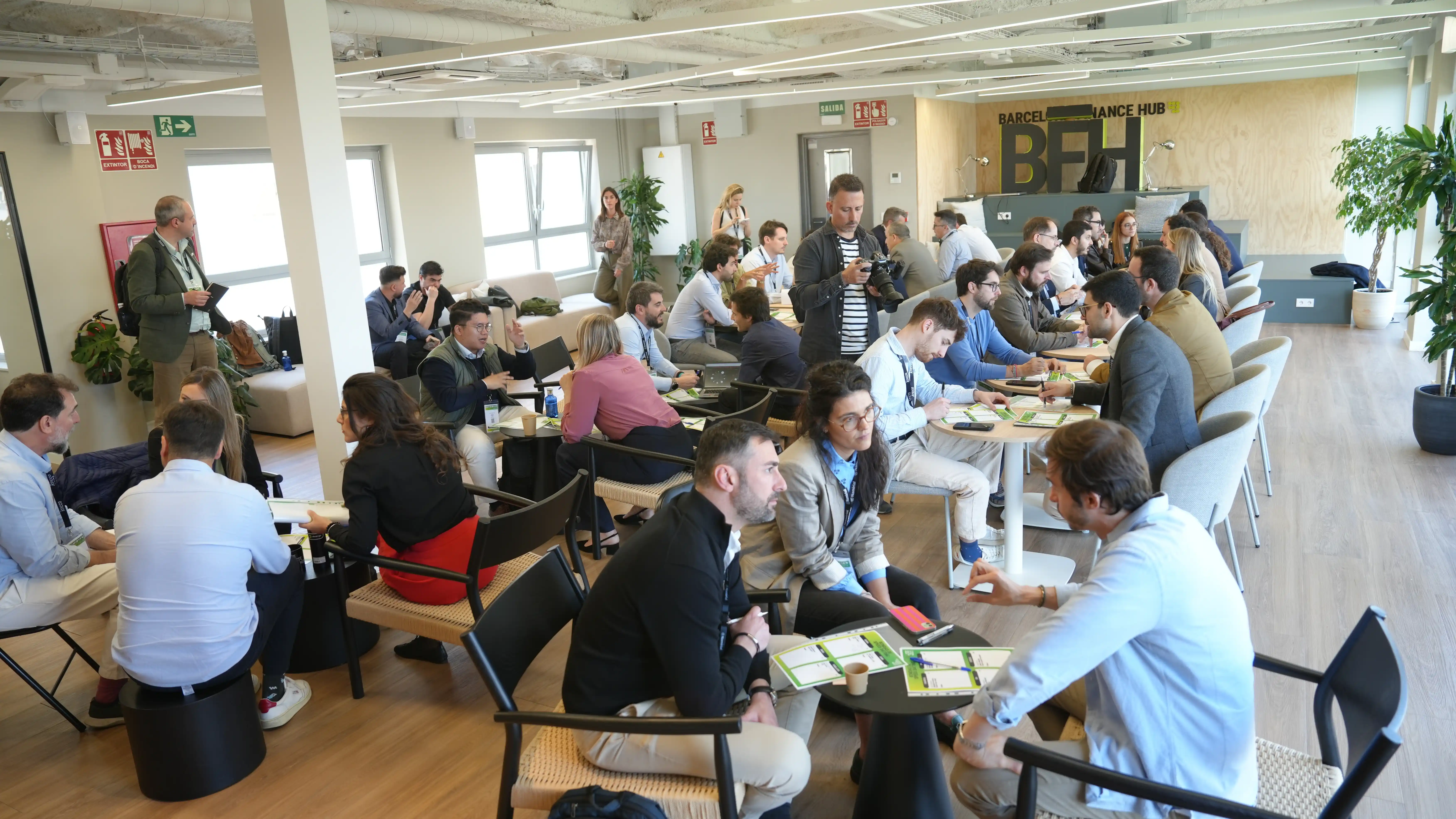 Speaker Presenting at Conference with Audience