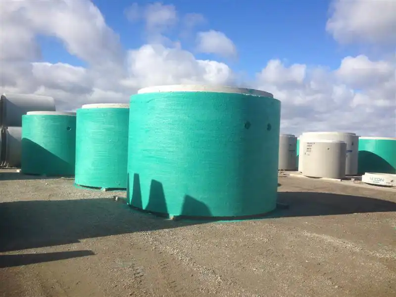 A photo of silos coated in Rub-R-Wall waterproofing coating to prevent water from getting inside