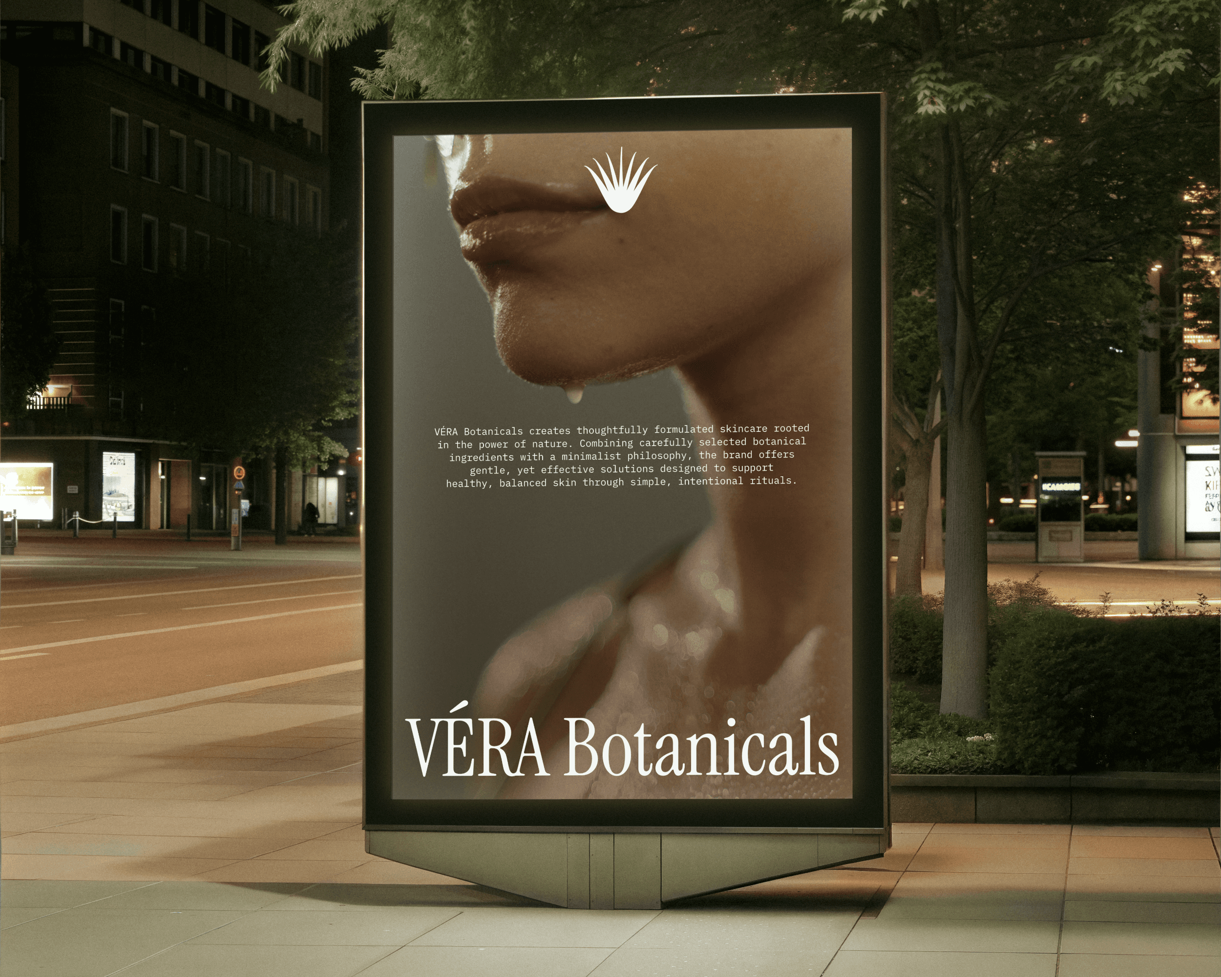 A poster design for the organic skincare brand VÉRA Botanicals. The poster features a closeup image of the bottom of a woman's face with the brand logo at the bottom of the poster and some text in the middle of the poster.