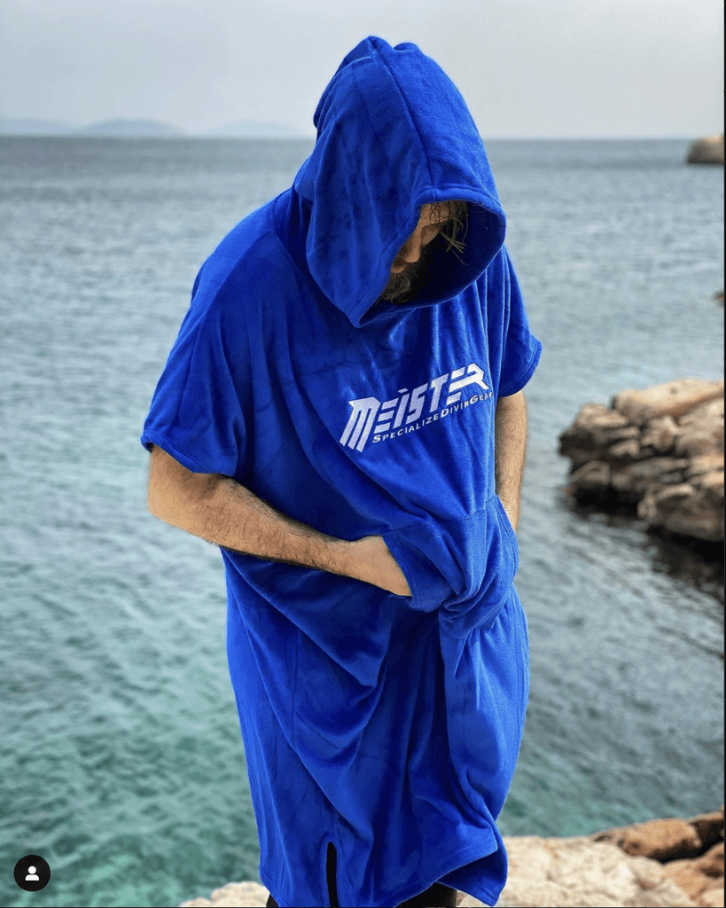 man wearing a meister poncho