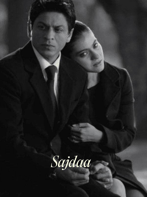 a group of people walking on a sidewalk