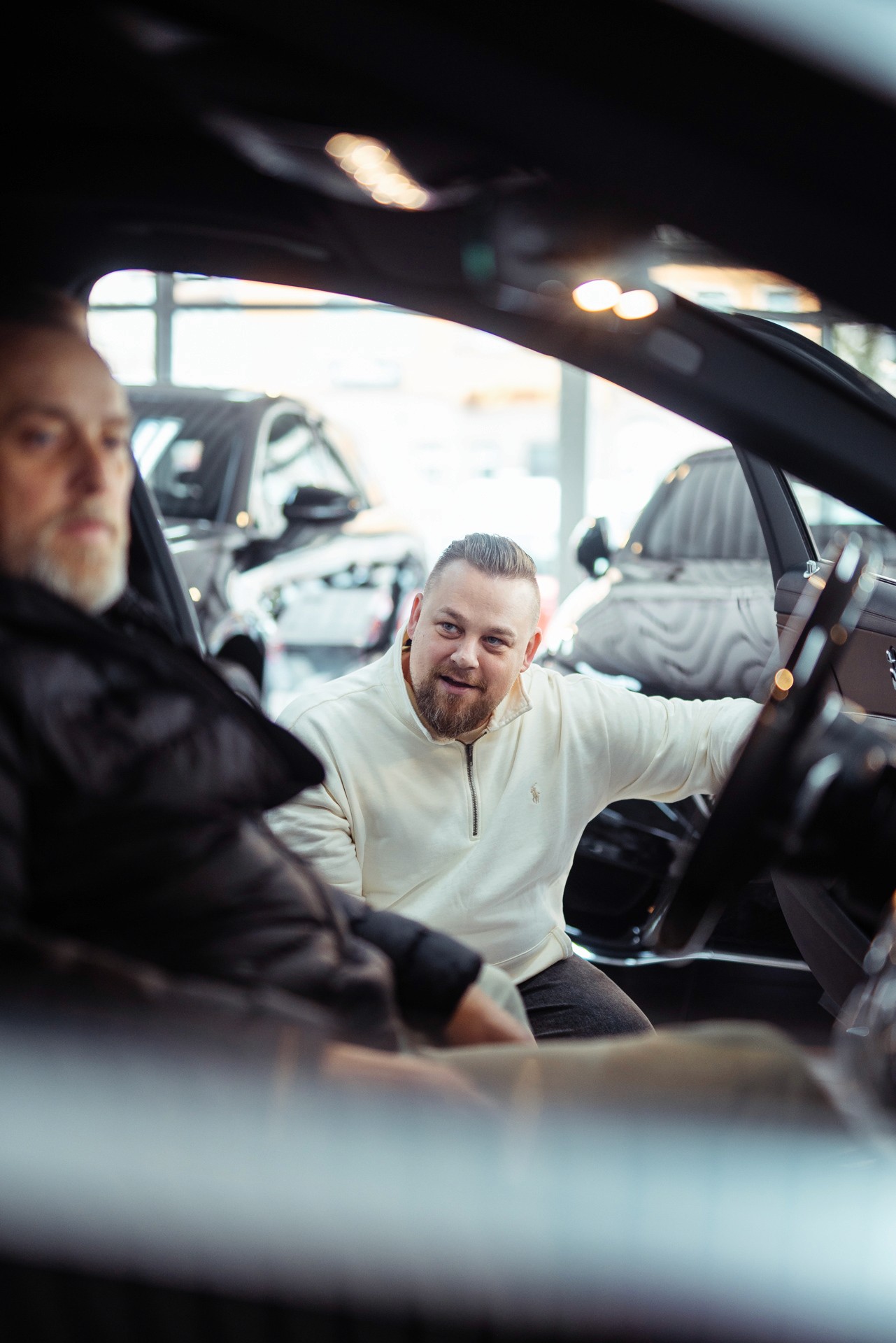 Person showing documentation to potential vehicle buyer