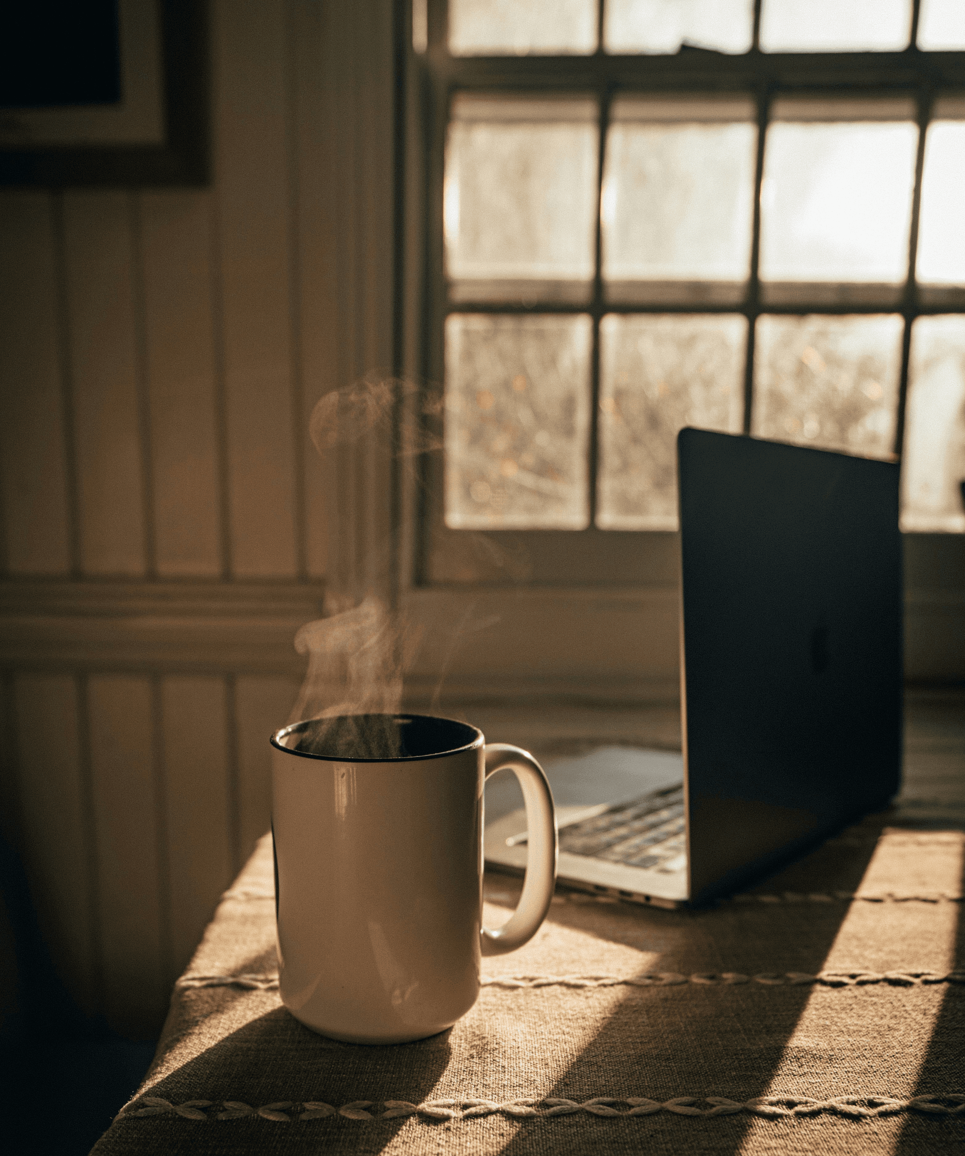 Mug with hot drink on a table