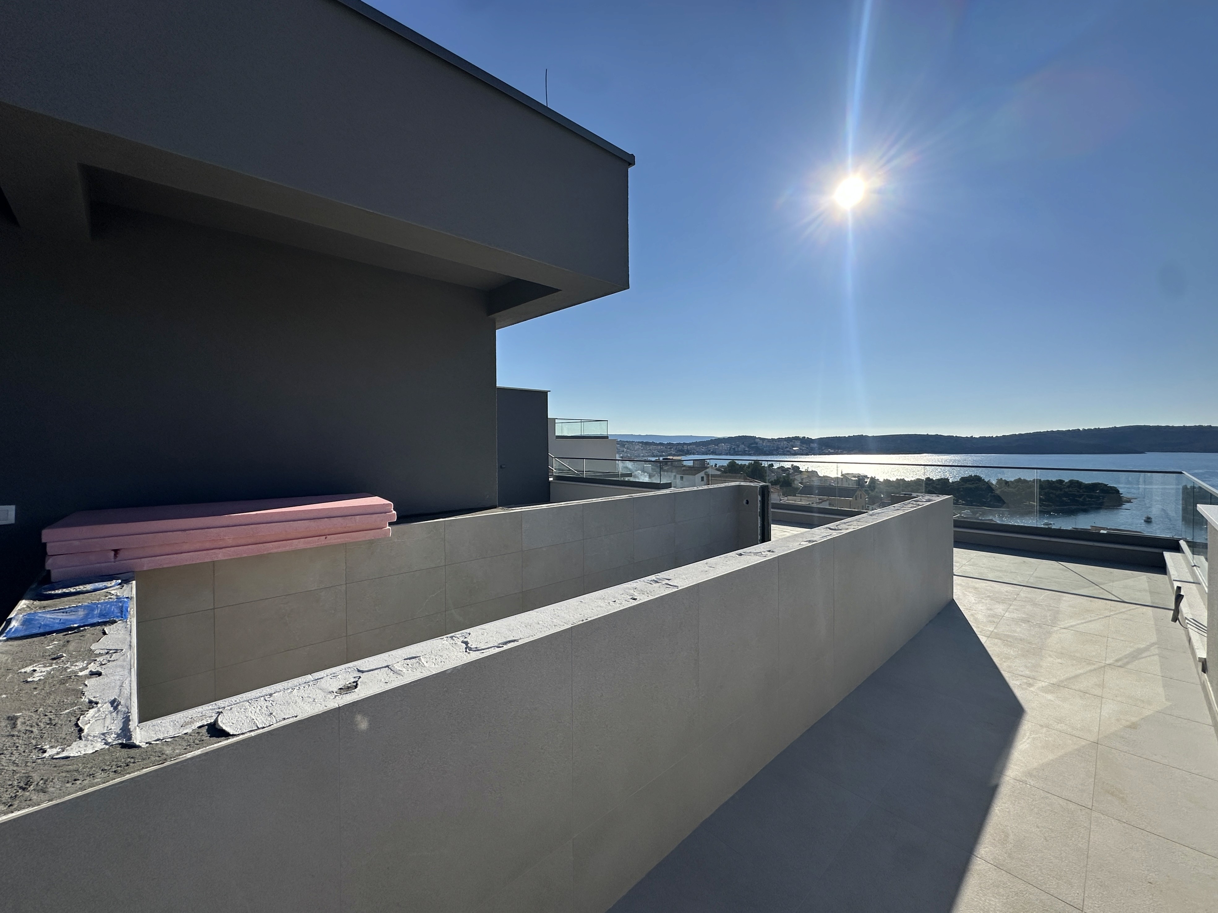 Large modern interior space with concrete walls