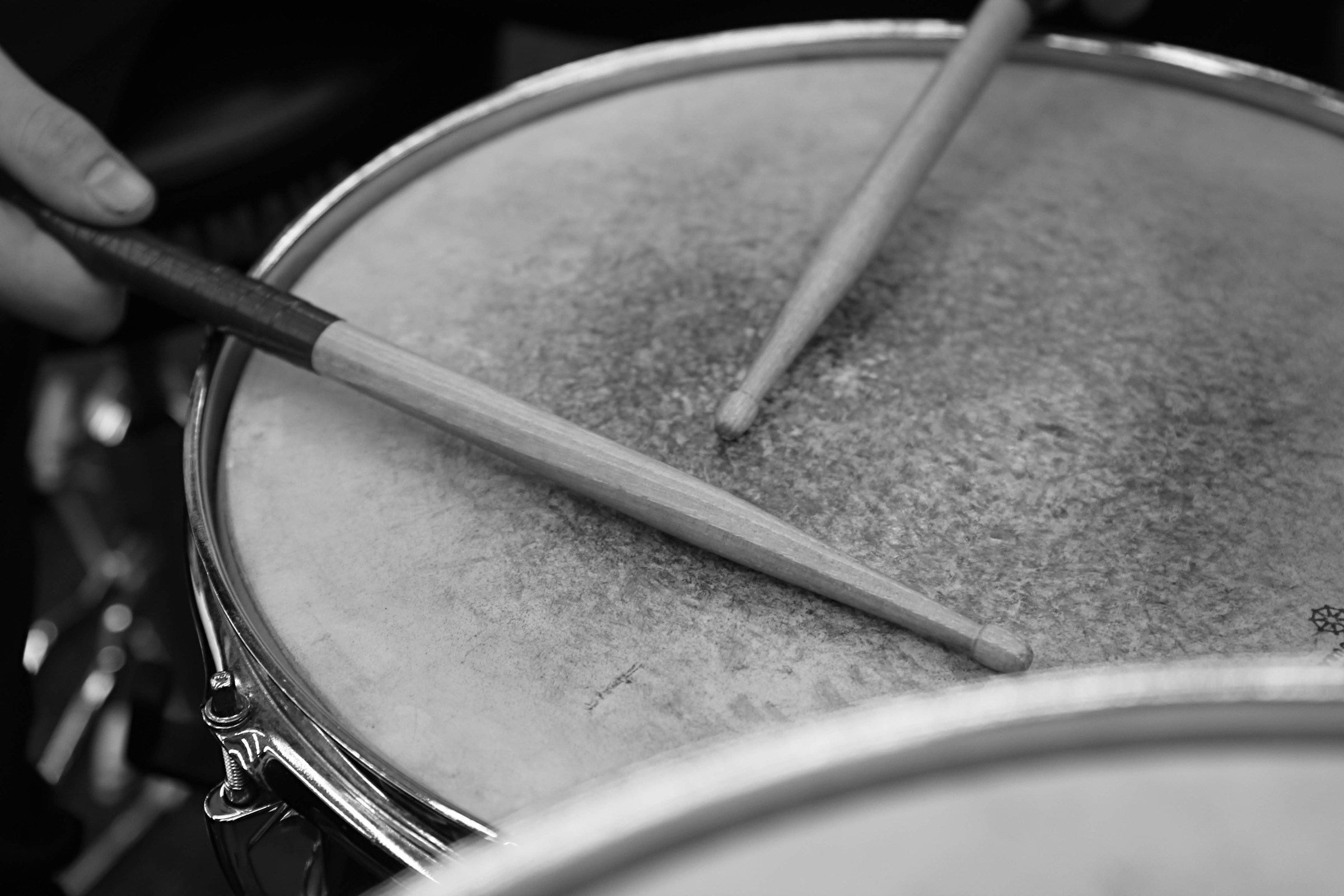 person with drums - How to Read Drum Sheet Music