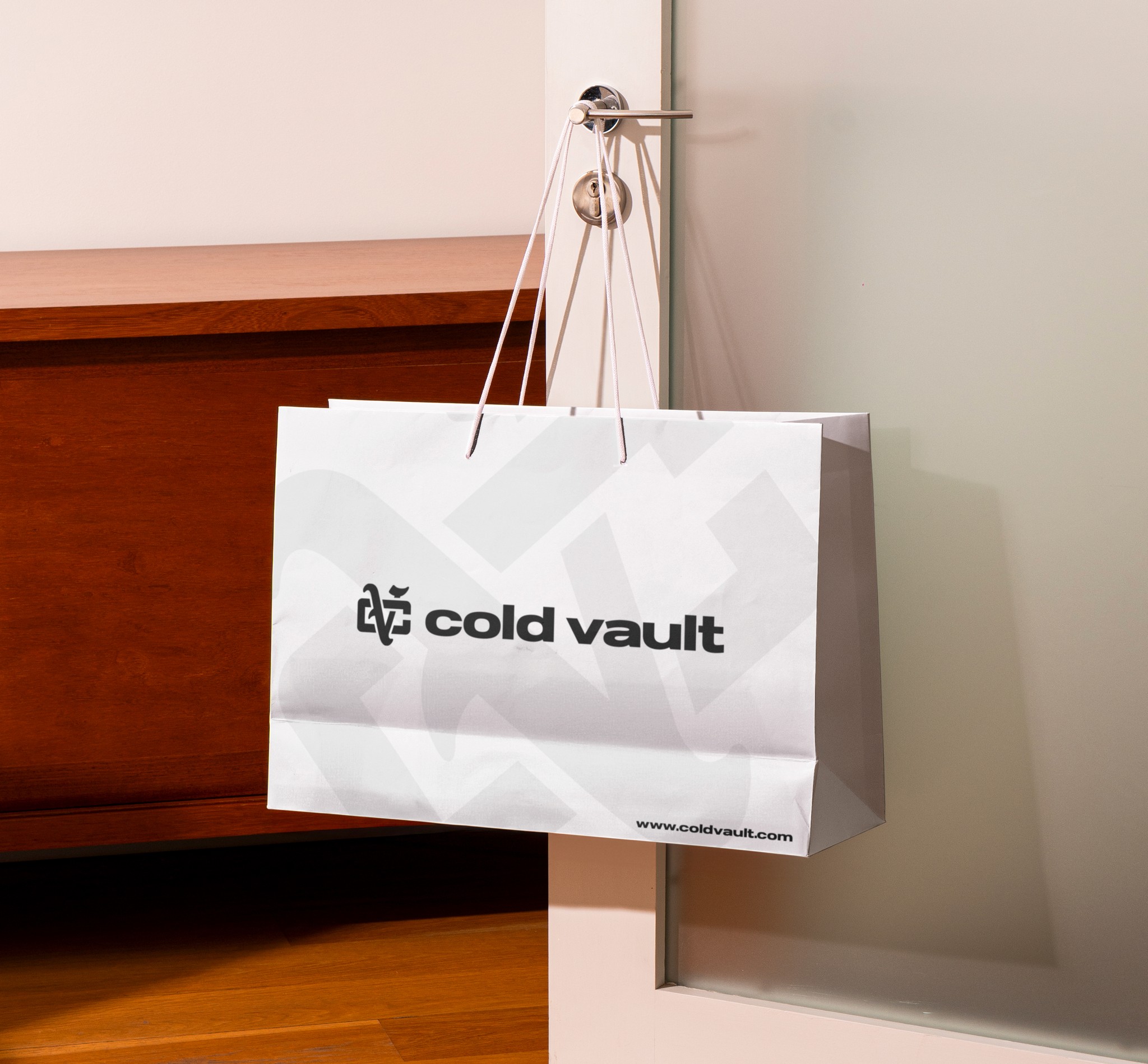 Minimalist packaging design for Cold Vault, including branded shopping bag