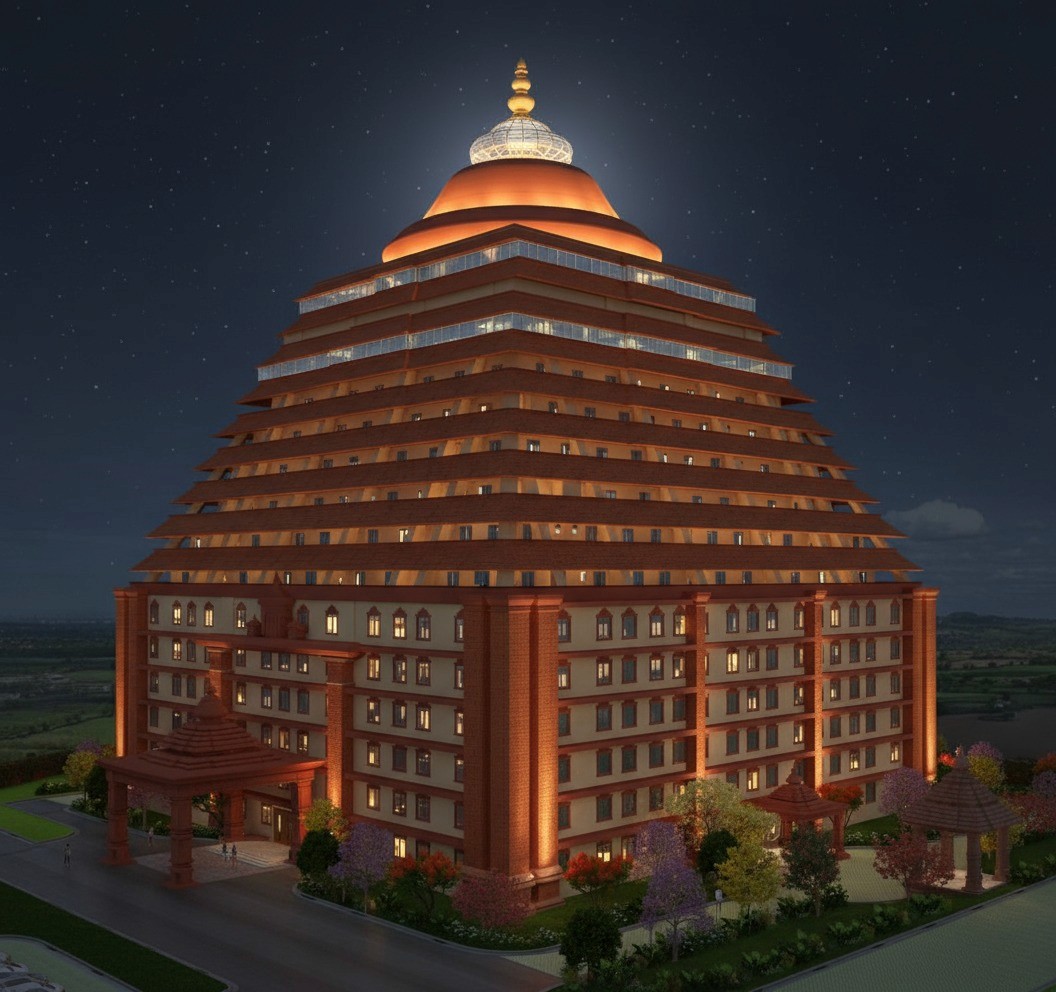 Aerial view of a winding road cutting through rocky terrain with patches of grass.