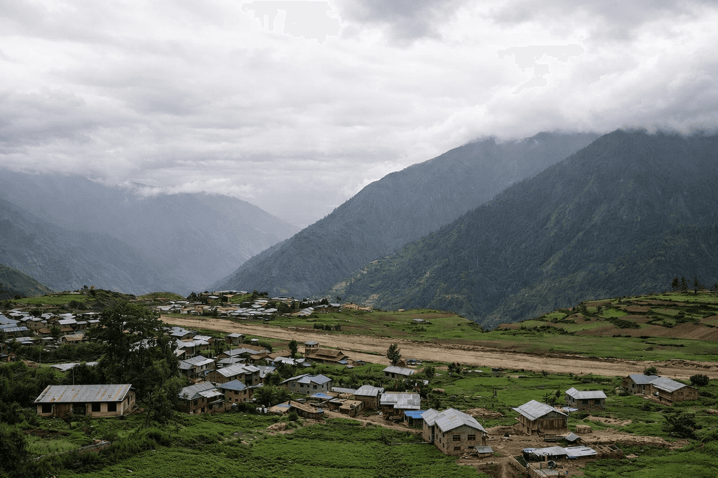 a view of a city and mountains from a distance
