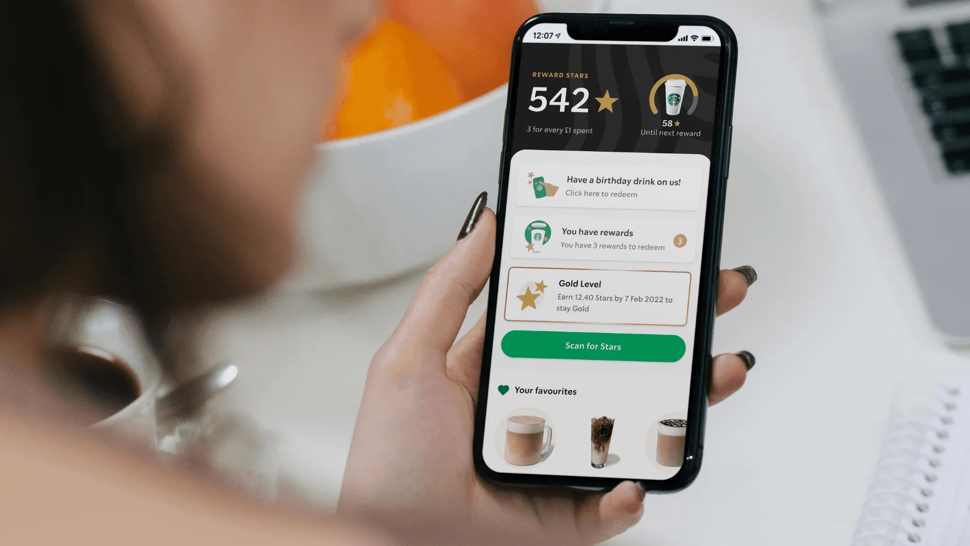 A phone showing the Starbuck Loyalty app