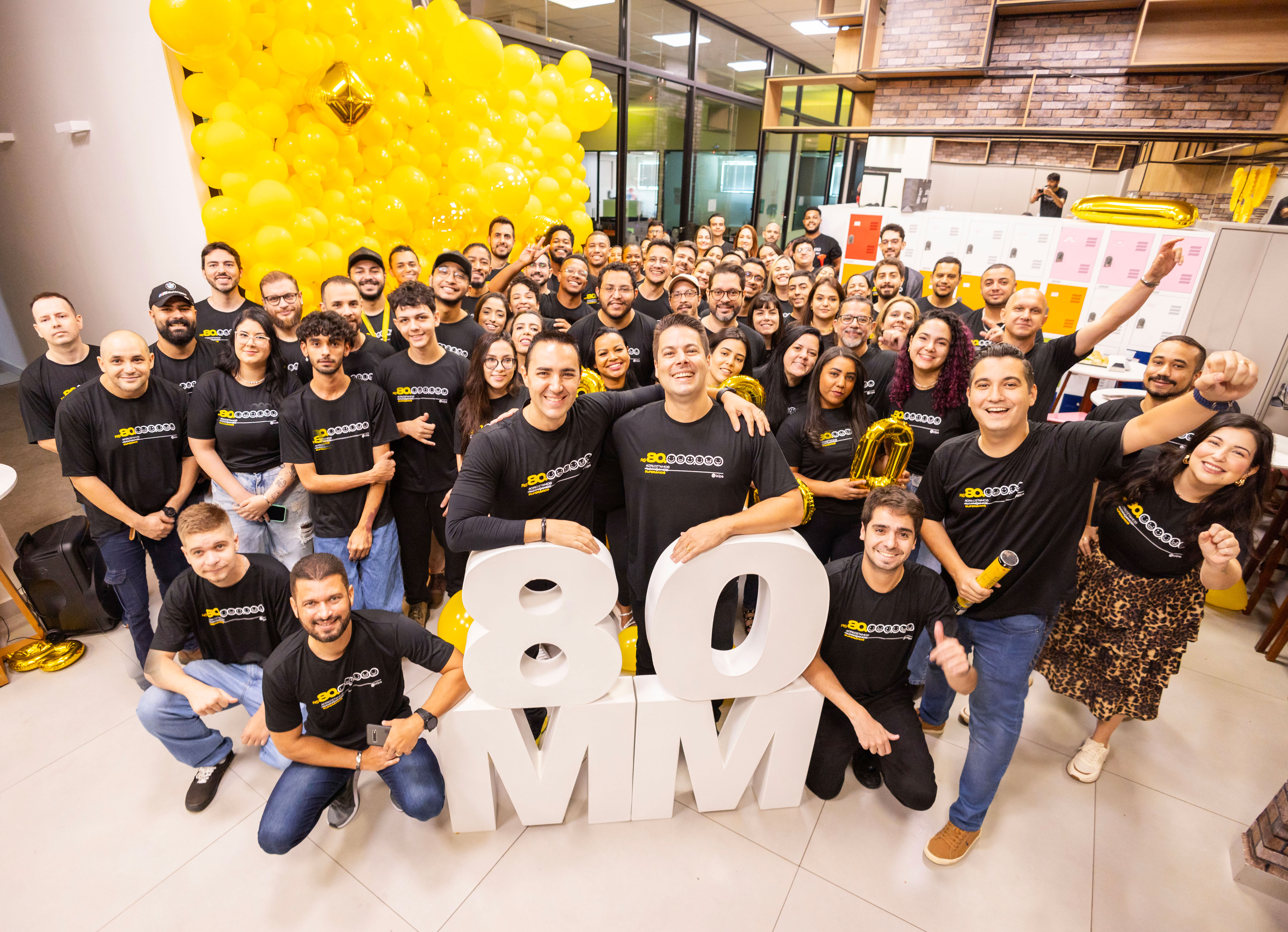 kids lying on a glass land and smiling