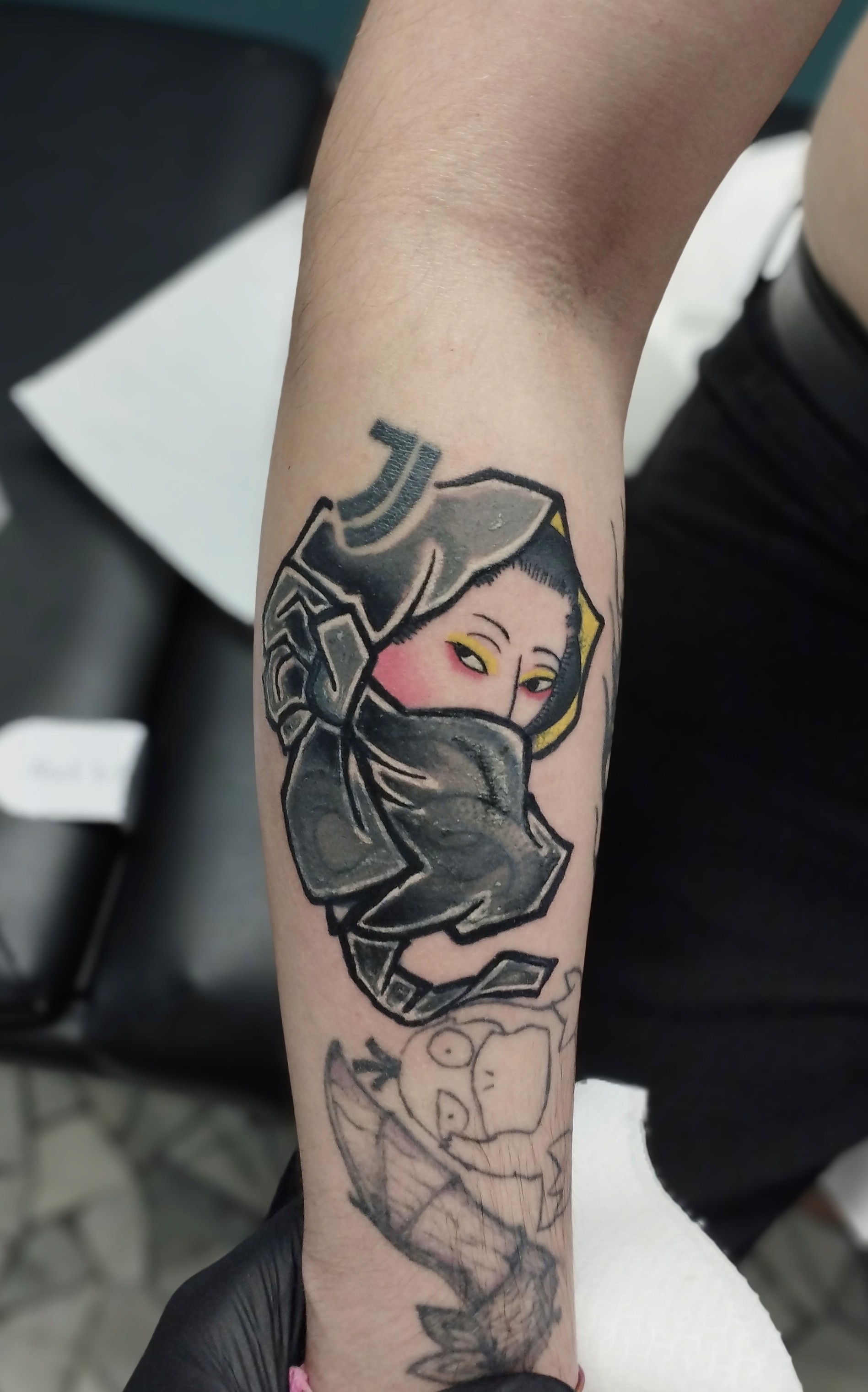 tatuaggio sull'avambraccio in stile chicano