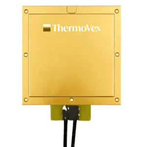 a close up of a red wall with metal rivets