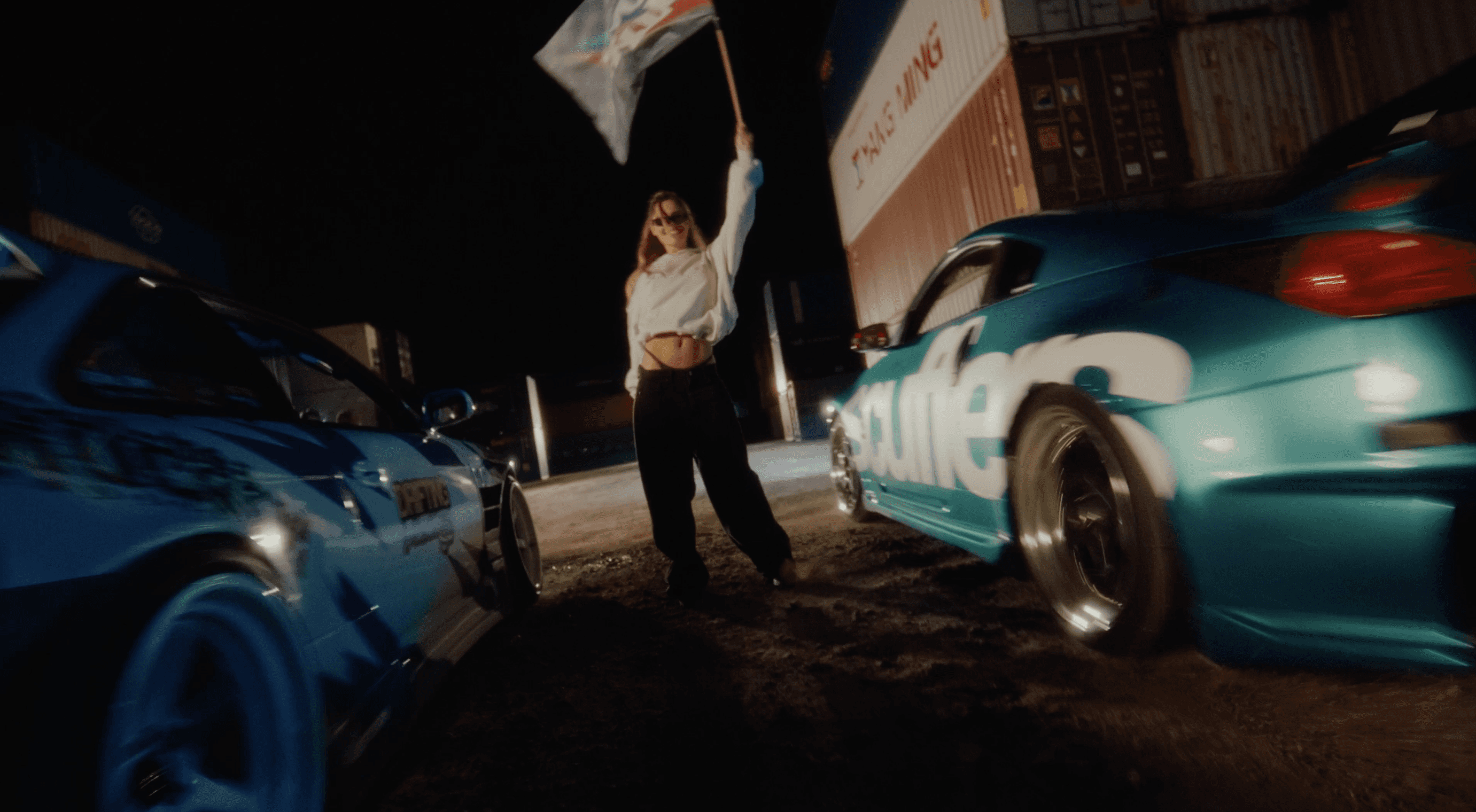 High-energy motorsport commercial scene with drift cars filmed for automotive brand production