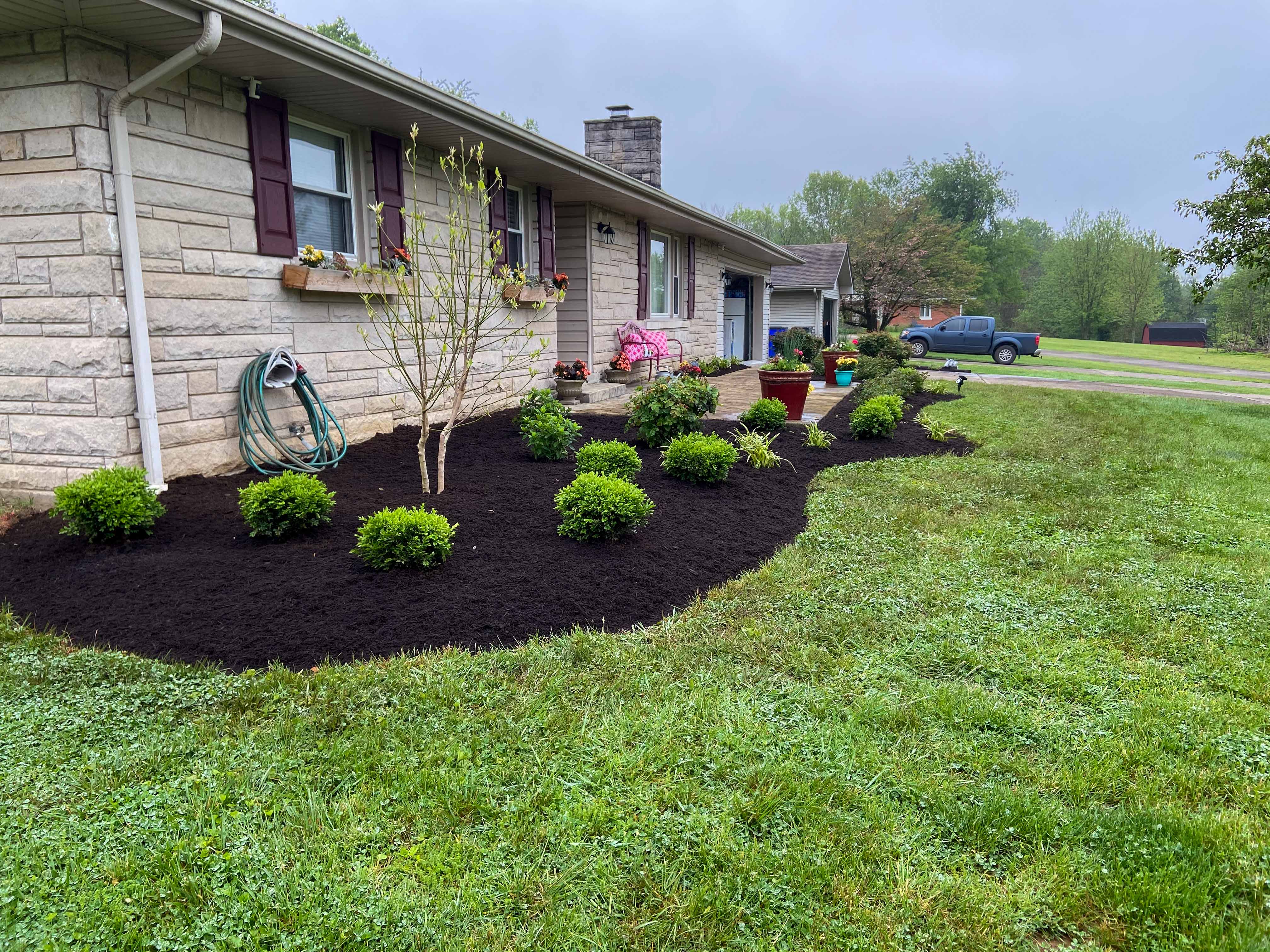 side view of planted and landscaped front yard