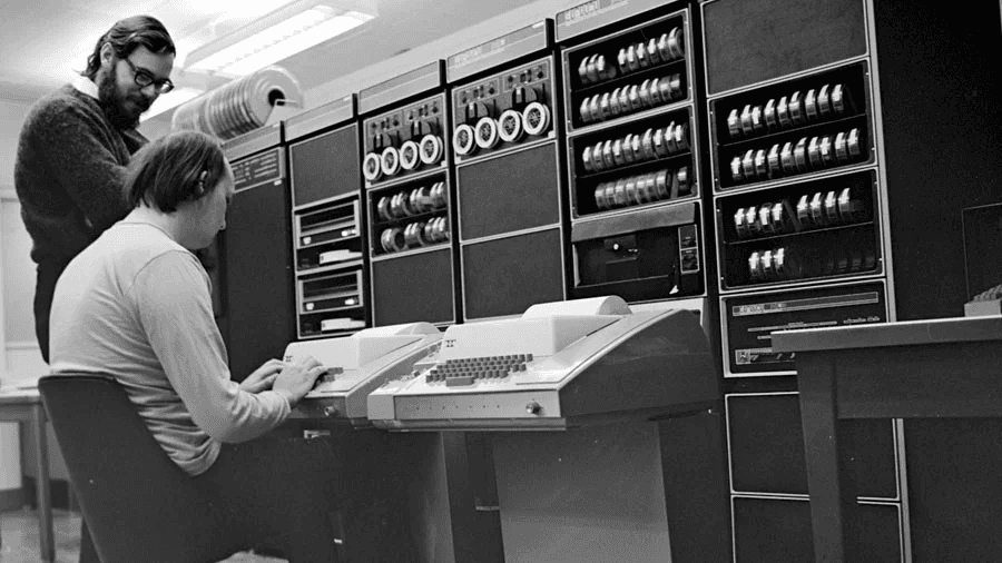 A man is using old computer