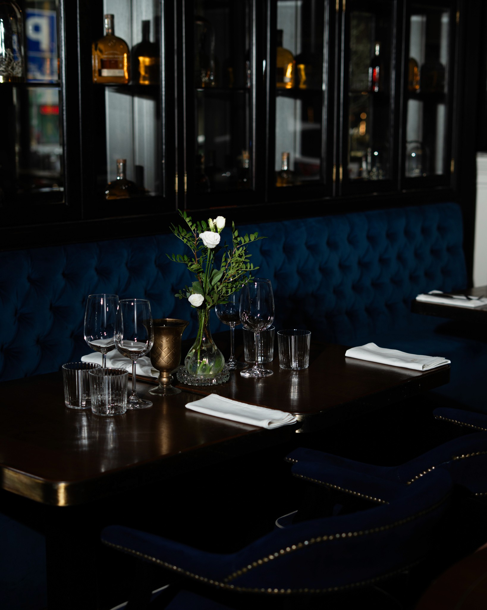 Woman Crossing Zebra Crossing Against Yellow Wall