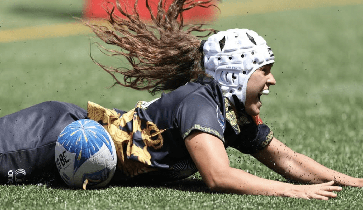 photo of montenegrin female player scoring a try