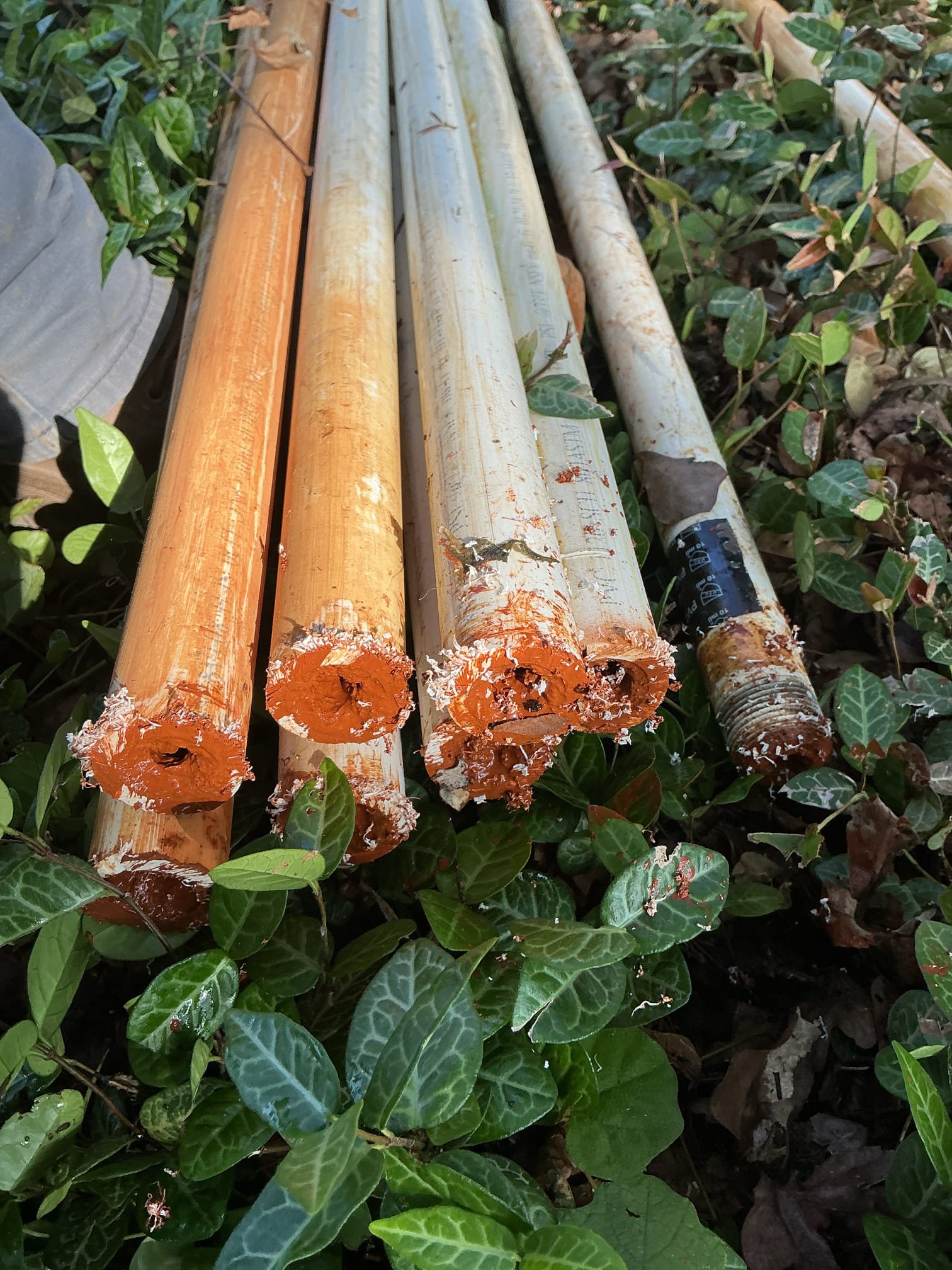 Corroded well pipe sections removed during well pump pulling service in DFW