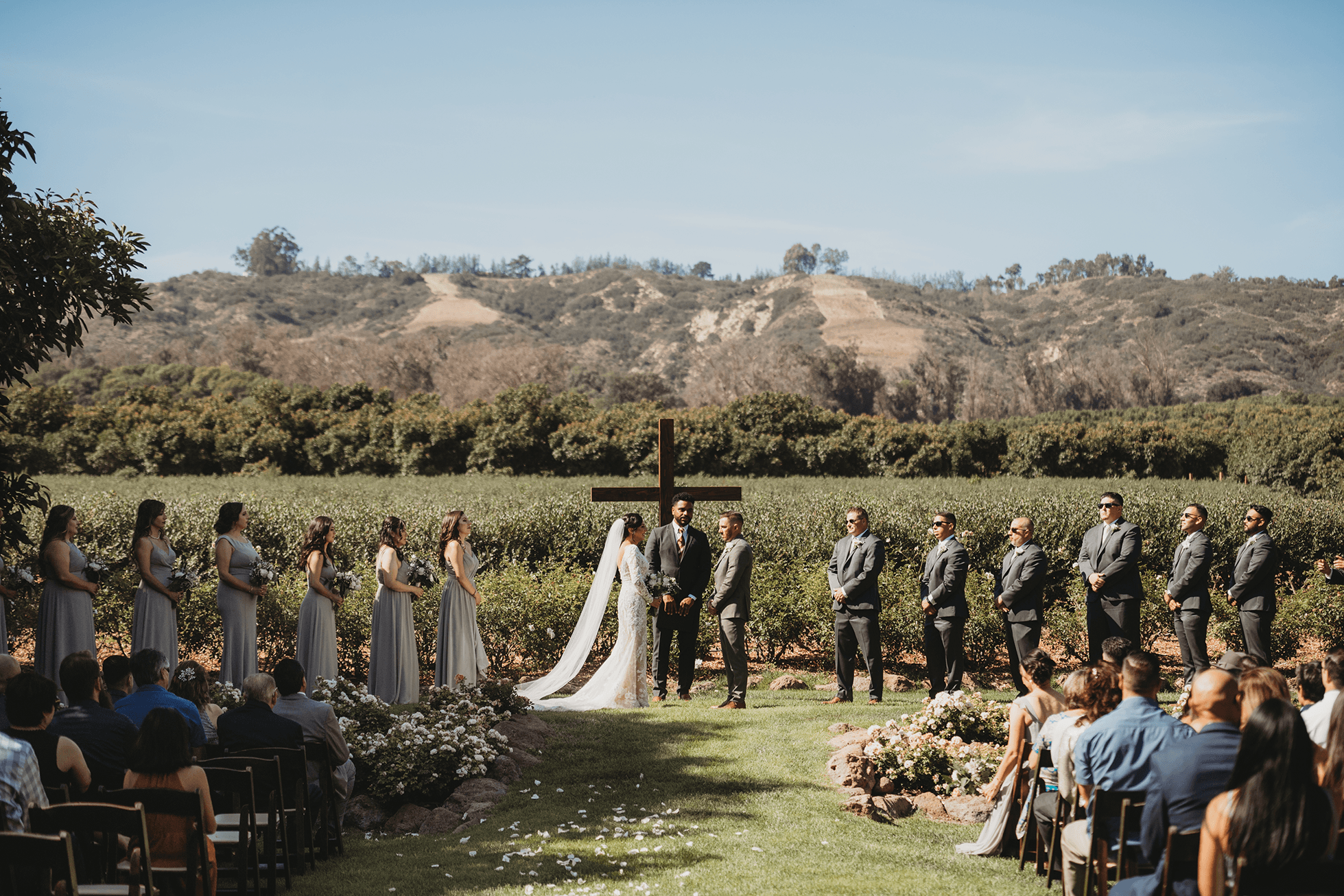 Wedding ceremony wide shot with guests and mountains in Santa Rosa Valley