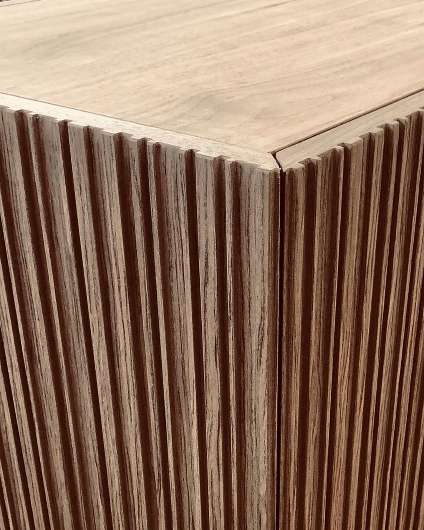 Detail of a fluted walnut corner
