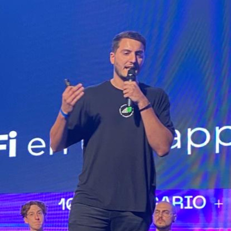 smiling woman wearing white and black pinstriped collared top