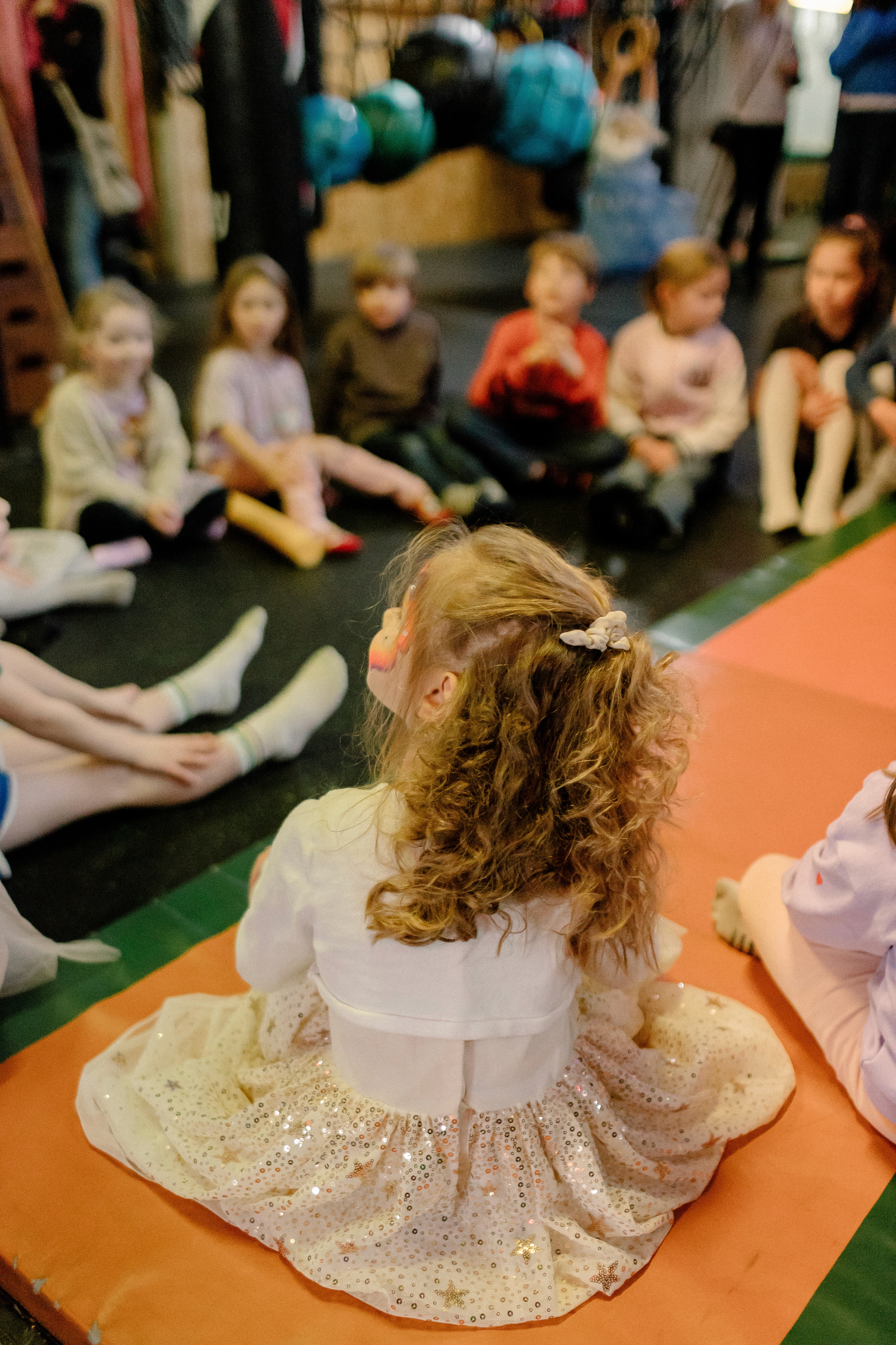A man stading with Surfboard