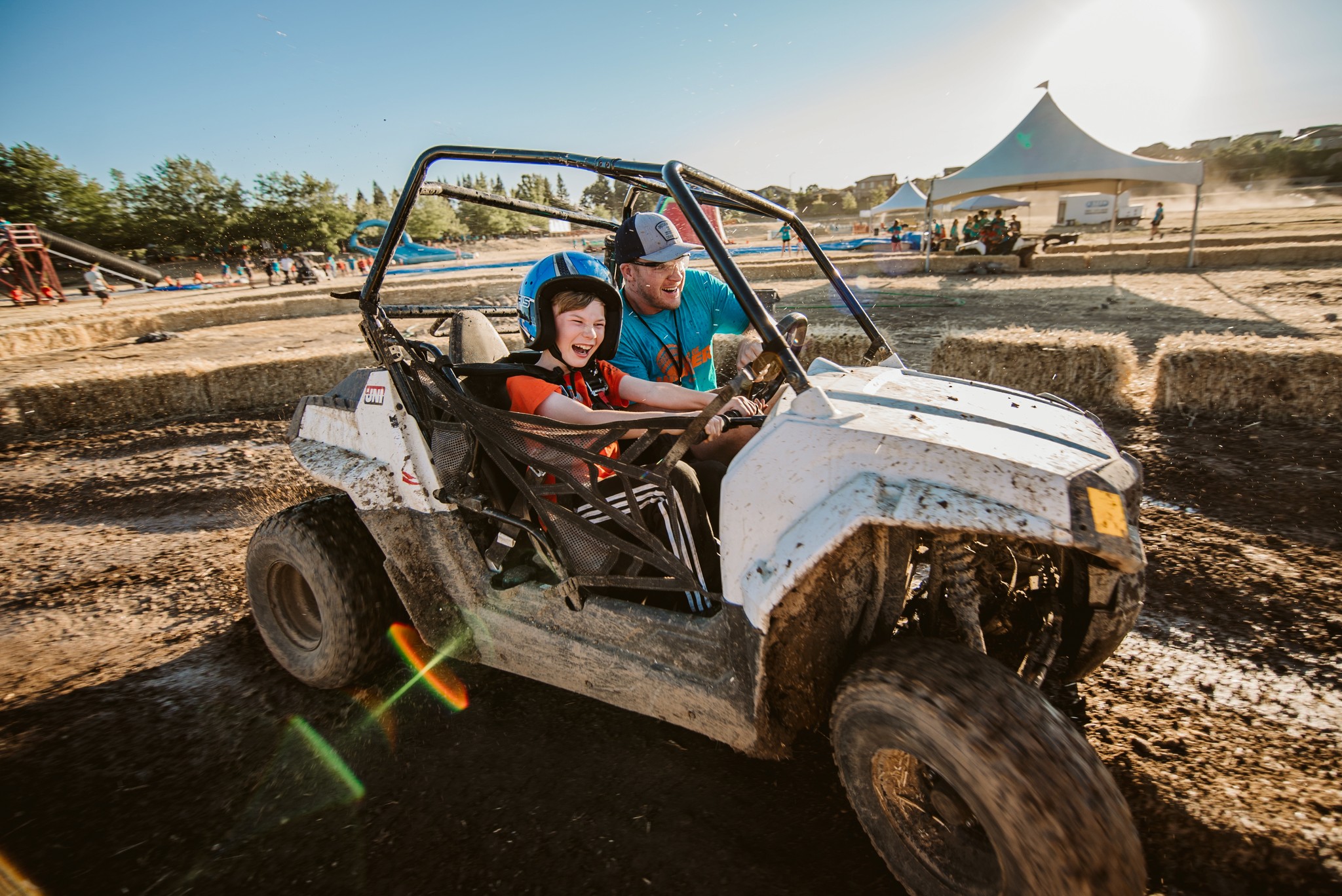 husband and wife working happily on a laptop