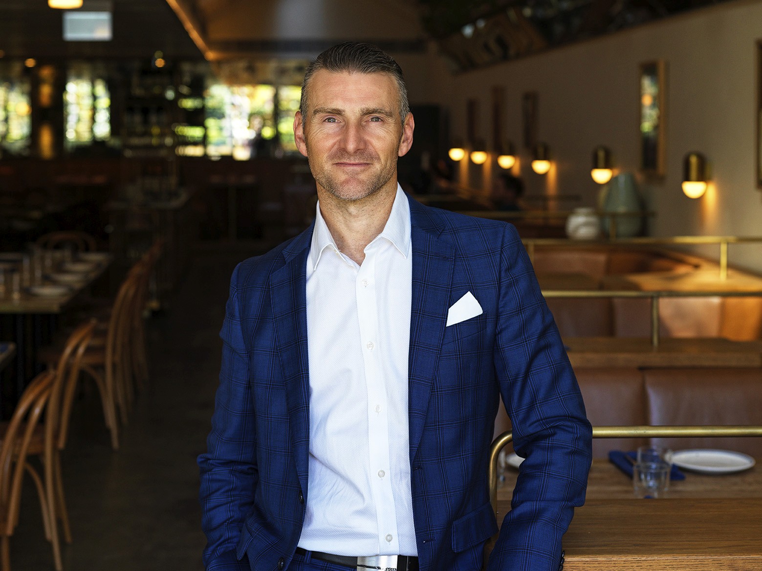 man in black hoodie standing