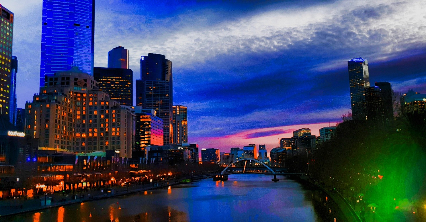people in a large building with Tate Modern in the background
