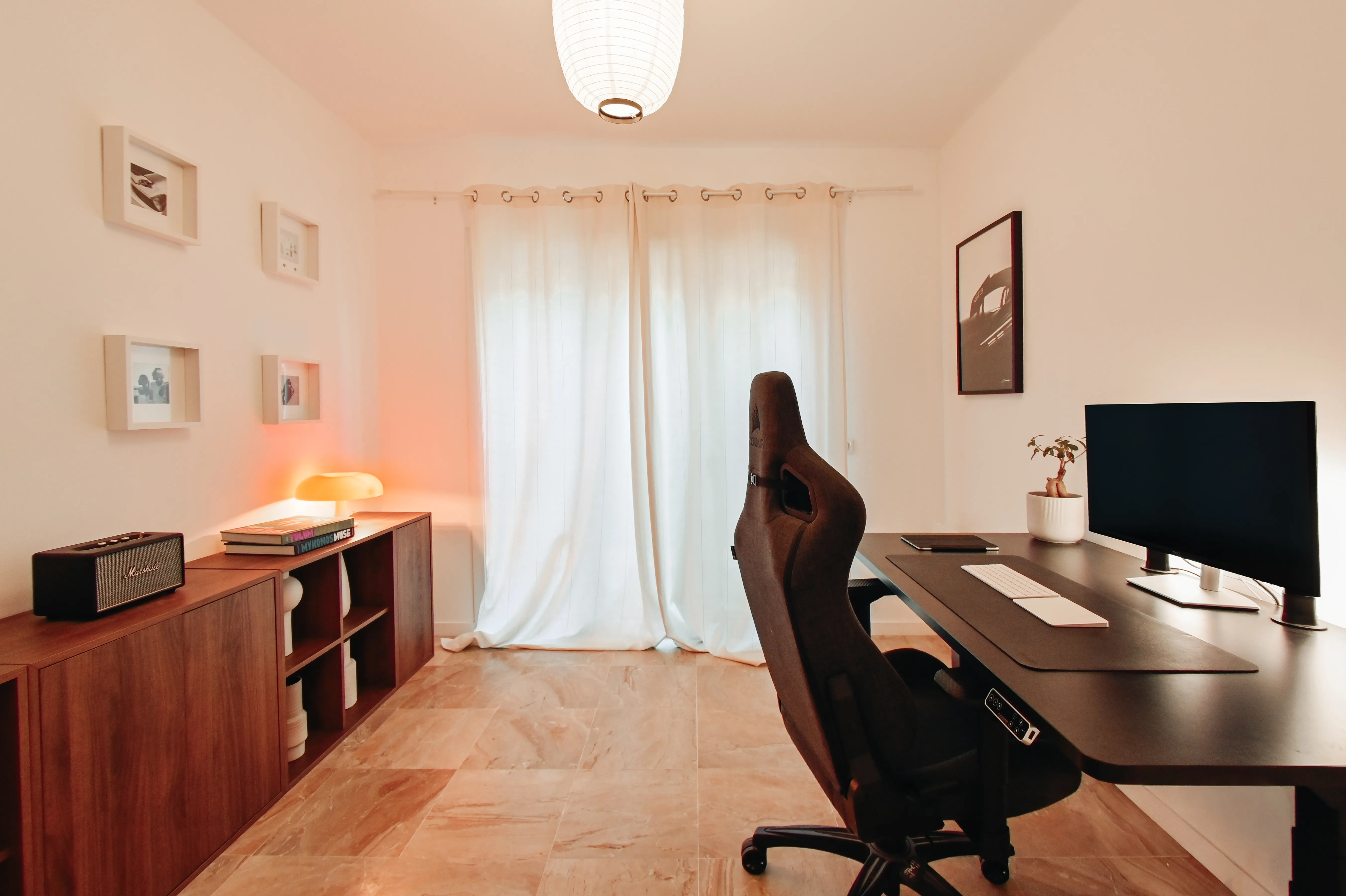 Streetside billboard with flyposters of the Batch.Works brand and illustrations