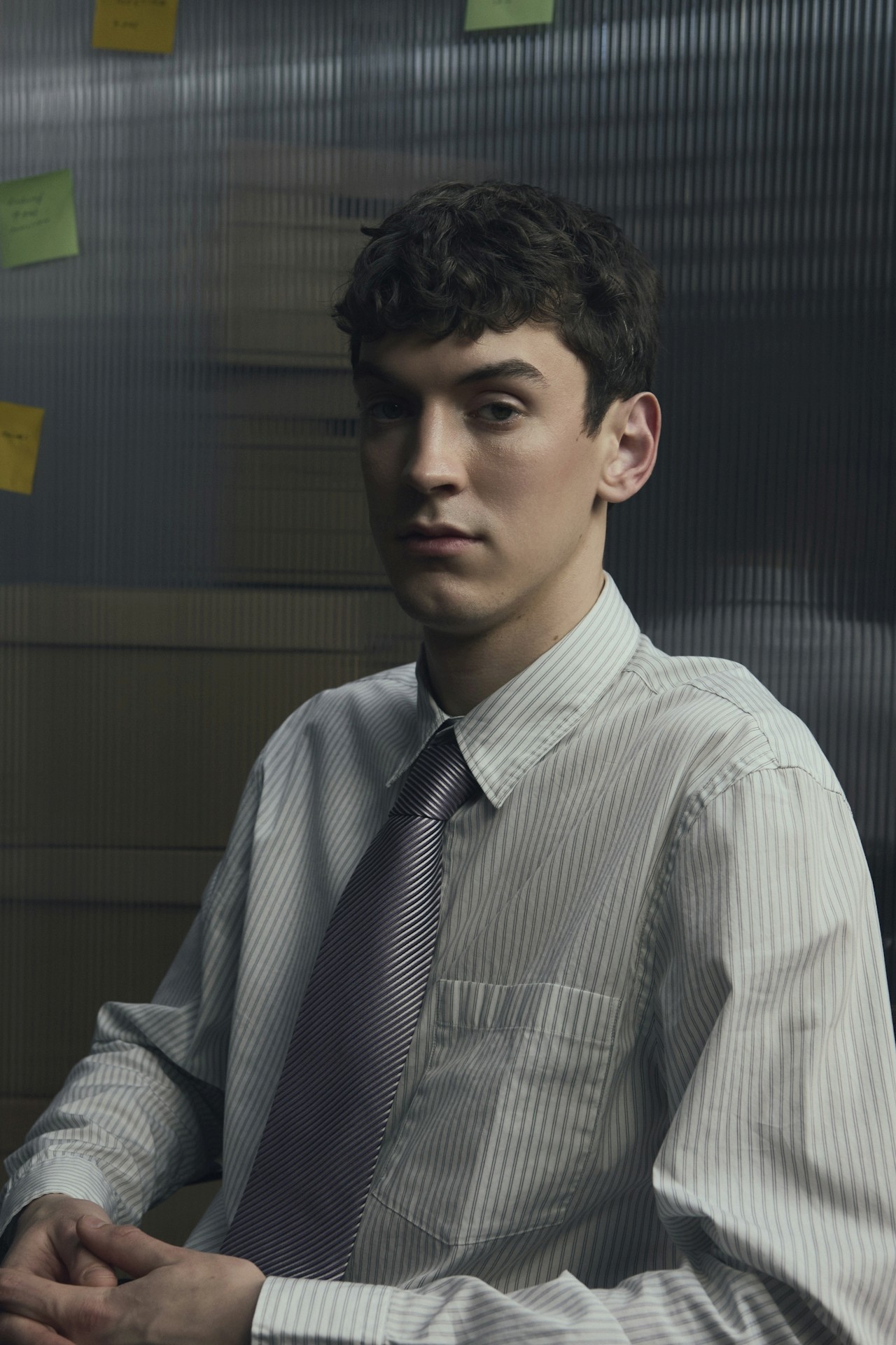 A well-dressed office man sitting