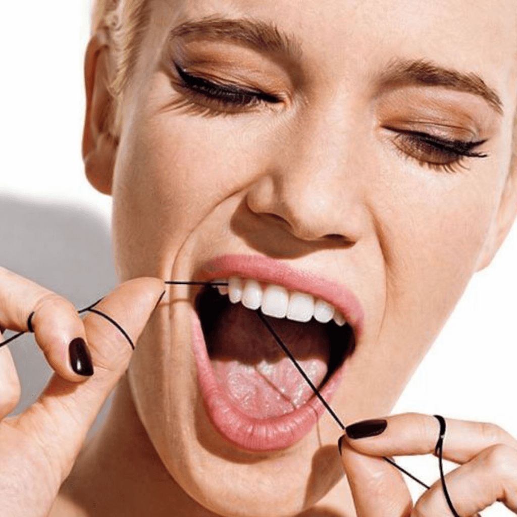 Beautiful lady with a ray of sunlight shining on her face