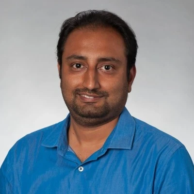 Couple hiking on a sunny trail