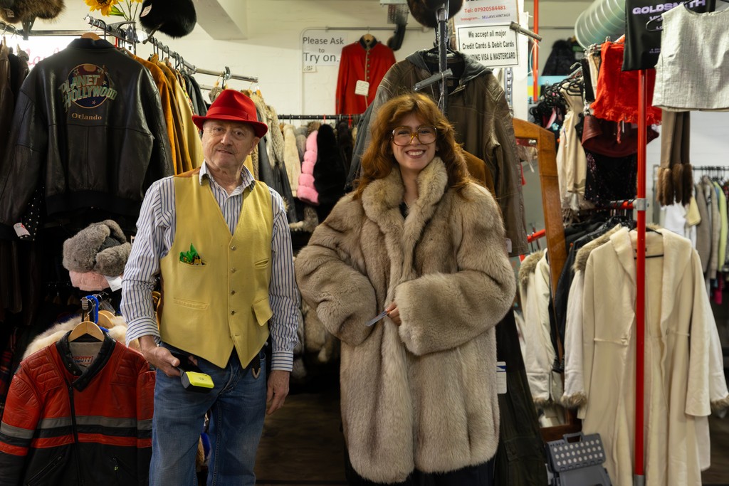 Vintage Clothing store couple posing