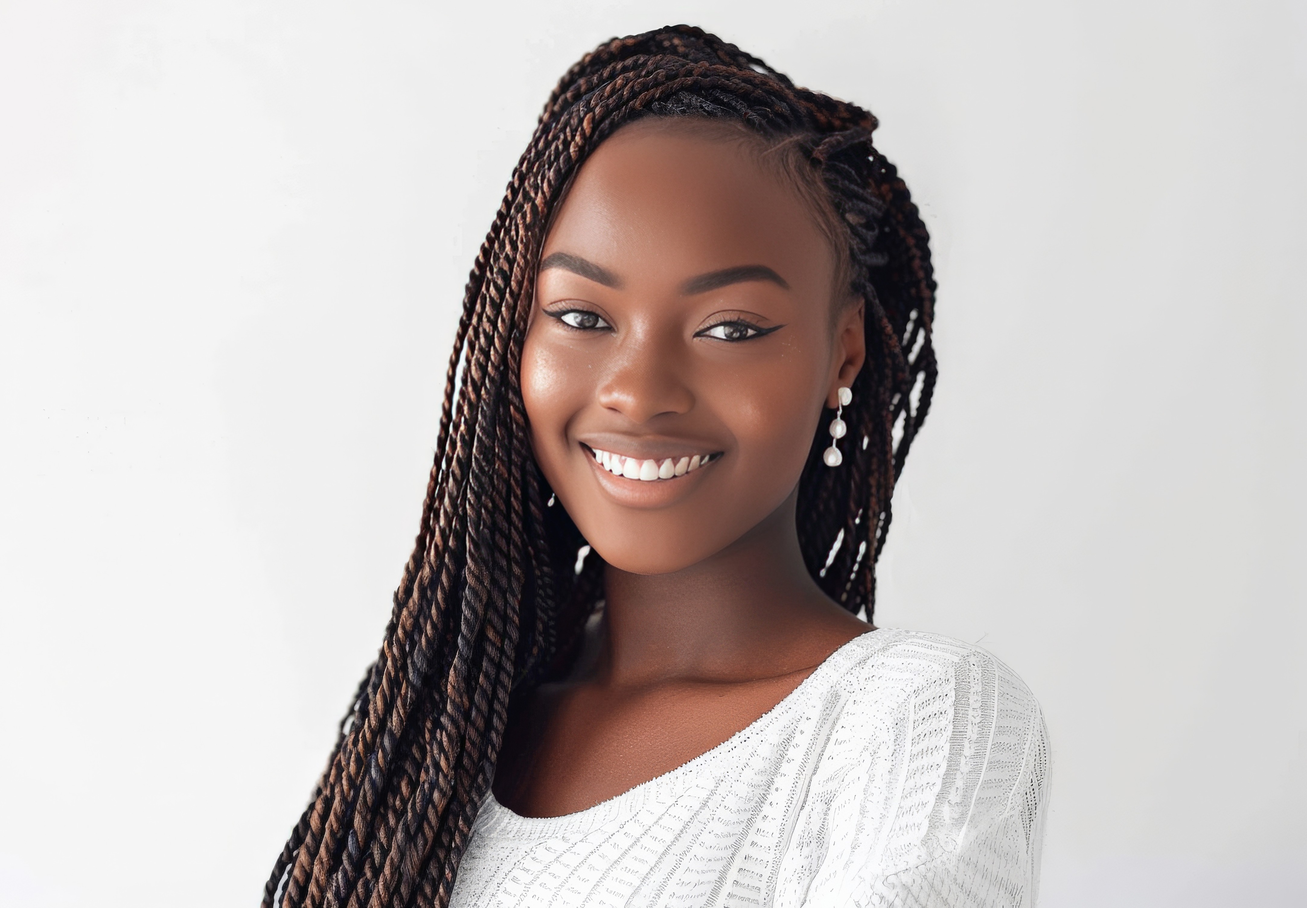 a woman with long red hair is posing for a picture