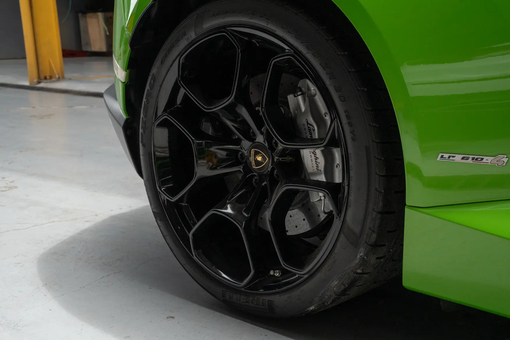Person at Ideal checking brakes of the car