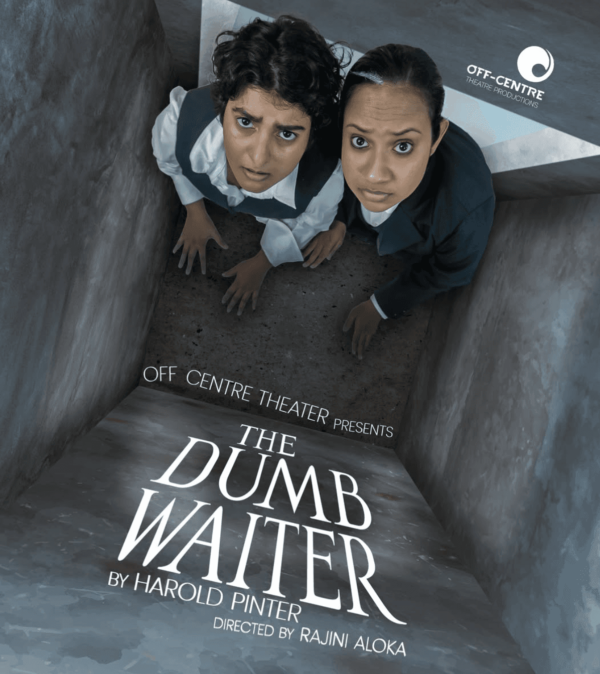 A man playing a drum in front of a group of people