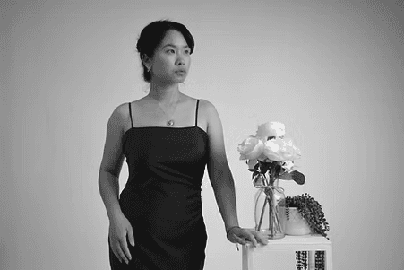 black and white protrait photography of woman standing elegantly