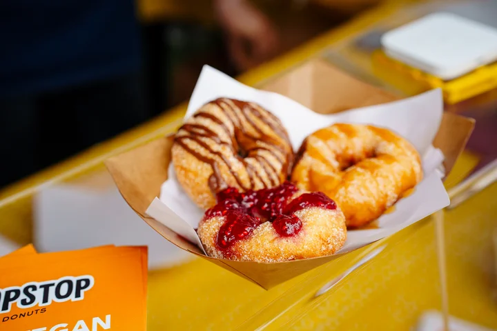 Delicious gluten free vegan donuts from dedicated coeliac safe deep fryer with various toppings