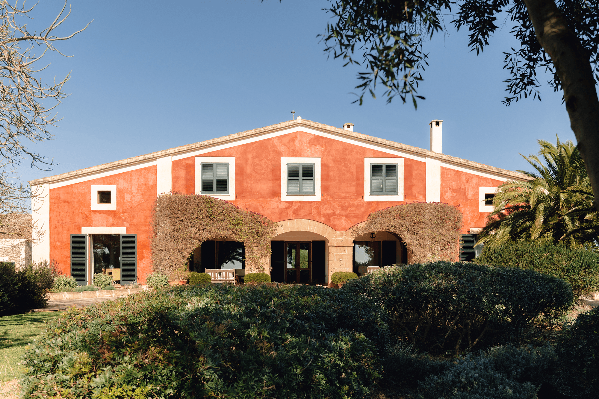 brown wooden lounge chairs on brown wooden dock during daytime