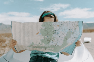 kid looking at map