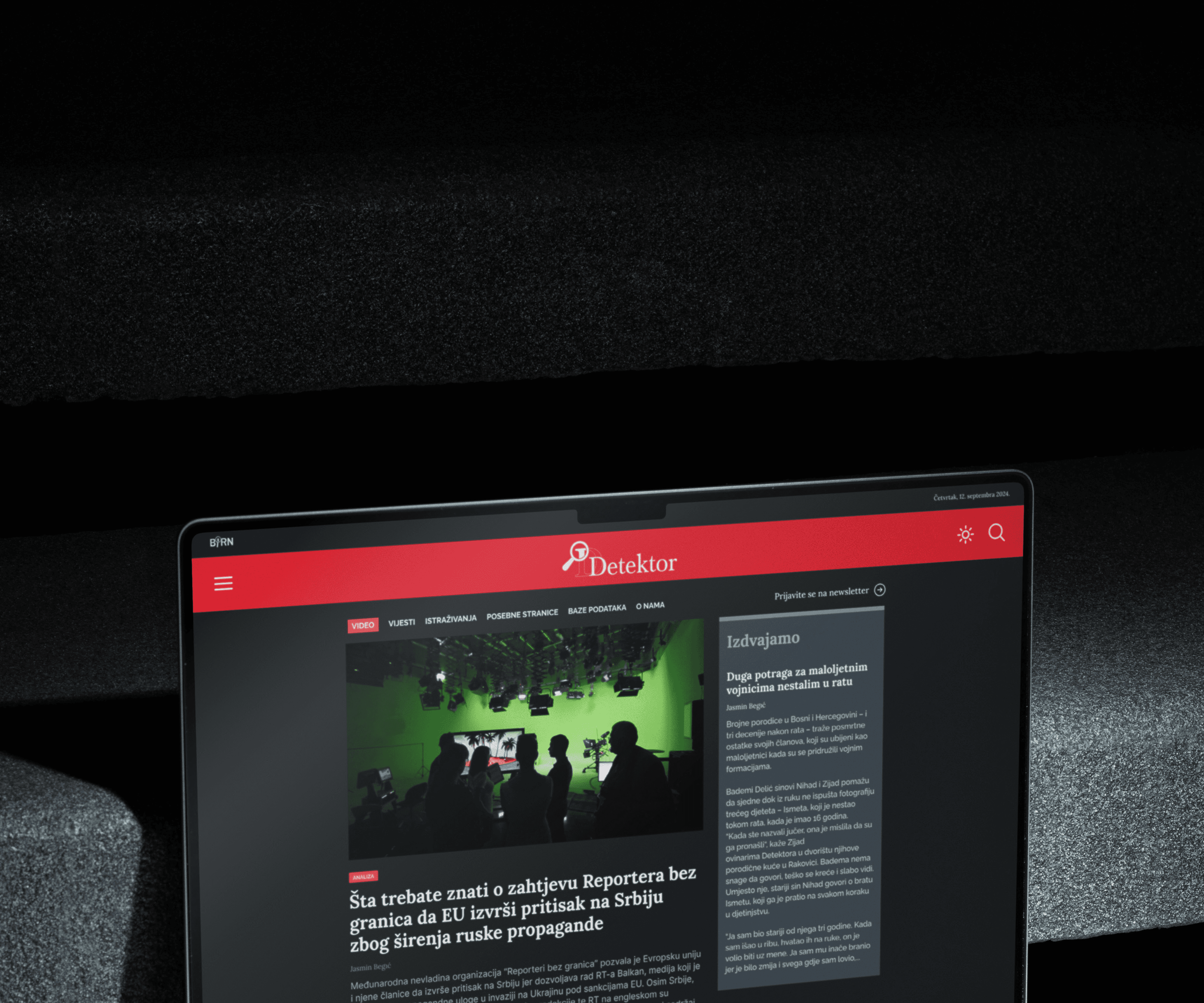 A laptop showcasing the landing screen of detektor.ba website, designed by ofc. Studio.