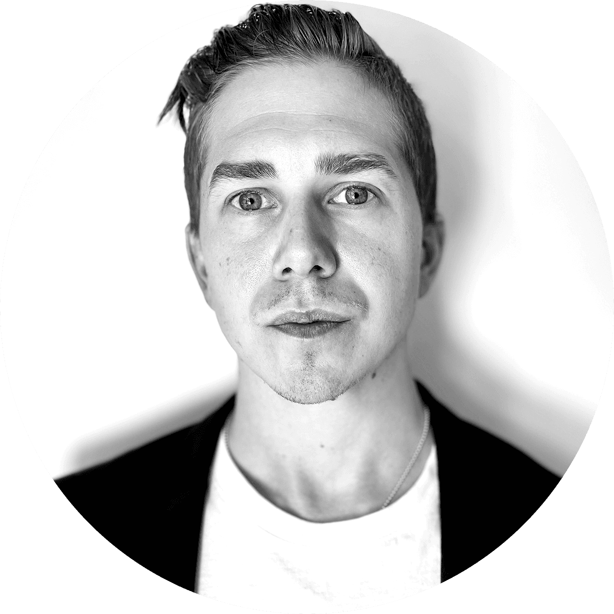 man in white crew neck t-shirt wearing black headphones