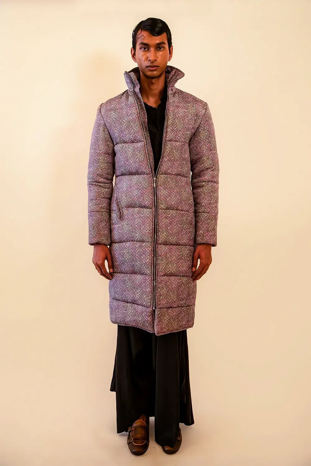 Agni is our one-of-a-kind printed silk puffer jacket, handcrafted by skilled artisans in-house using a one-of-a-kind vintage silk saree.