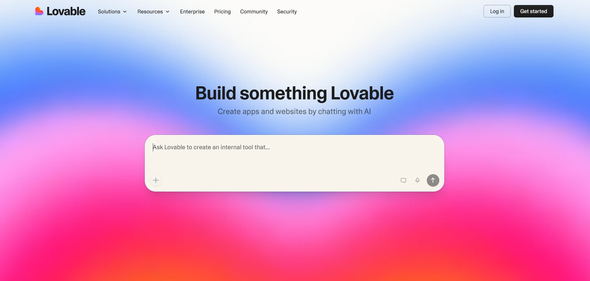 Lovable website homepage featuring an AI app creation prompt on a vibrant gradient background.