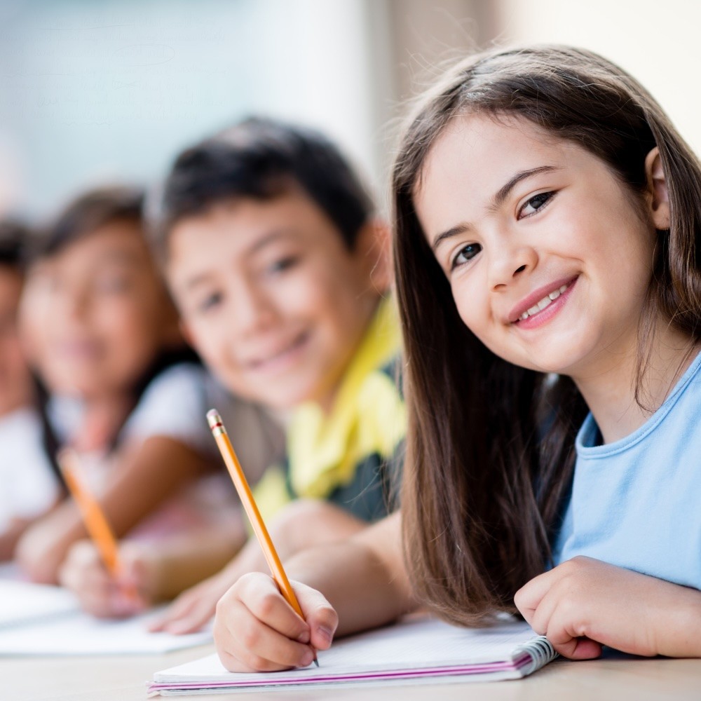 portrait of the teacher in the classroom before the lesson starts