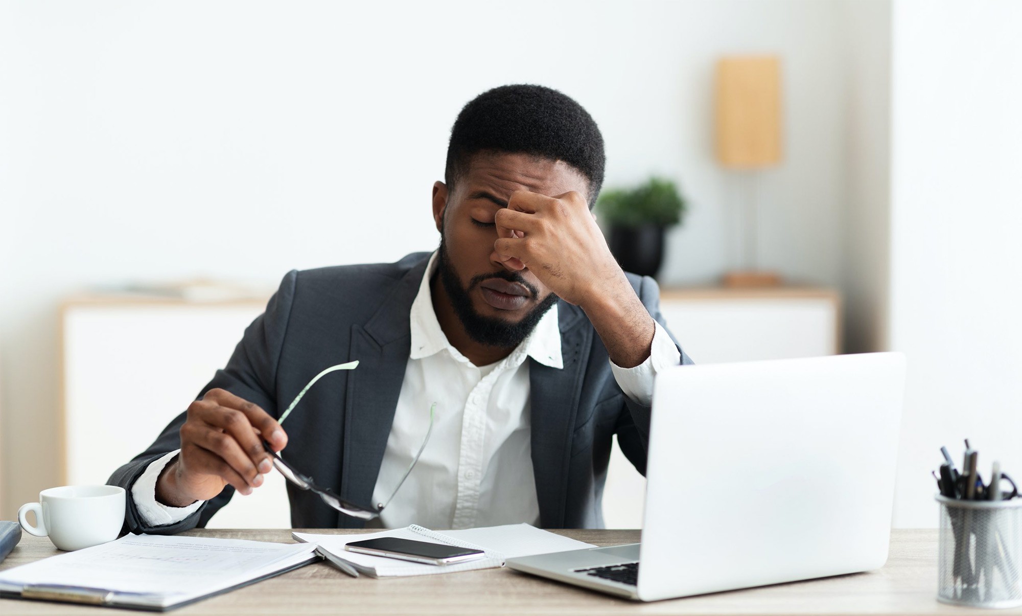 Small UK business owner reviewing site analytics for SEO errors