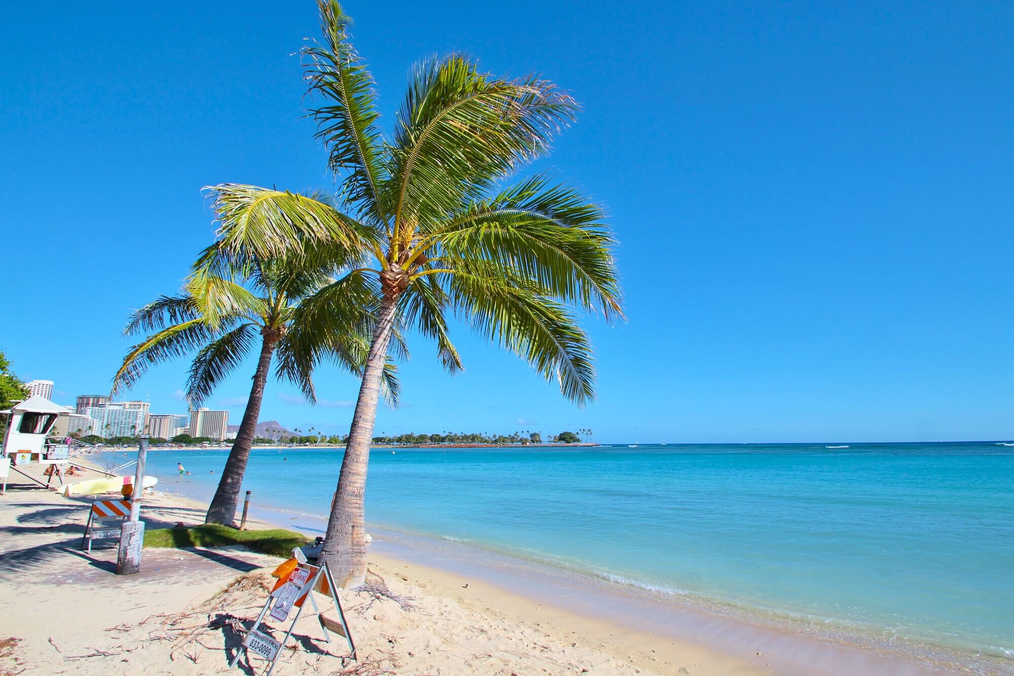 woman floating on body of water