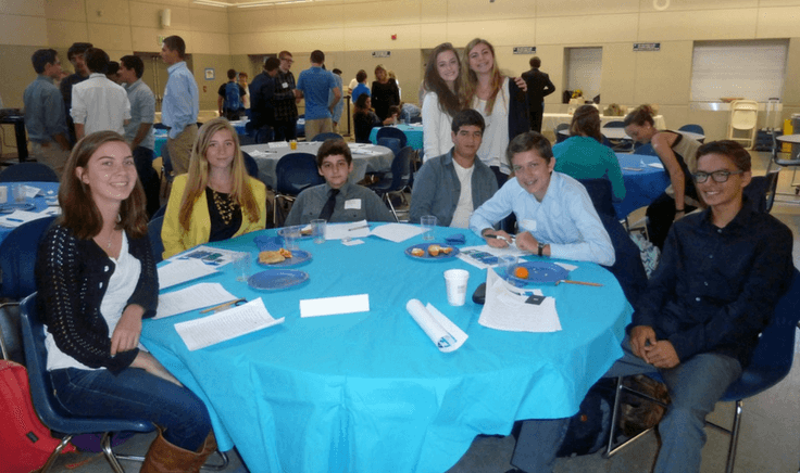 Members of the first cohort of students at a Biotech Institute conference in 2015.